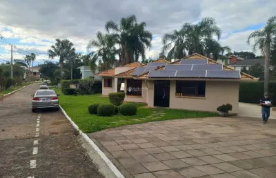 Casa em condomínio fechado com 3 quartos à venda na estrada capitão gentil machado de godoy, 4500, vila elsa, viamão, 250 m2 por r$ 960.000