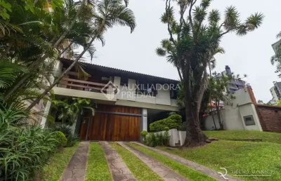 Casa em condomínio fechado com 4 quartos à venda na rua carlos trein filho, 1255, auxiliadora, porto alegre, 440 m2 por r$ 3.990.000