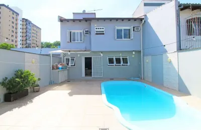 Casa com 4 quartos à venda na rua irene capponi santiago, 186, cristo redentor, porto alegre, 244 m2 por r$ 1.350.000