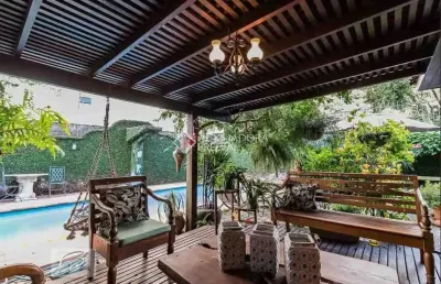 Casa com 5 quartos à venda na rua itaboraí, 1490, jardim botânico, porto alegre, 370 m2 por r$ 1.800.000