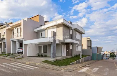 Casa em condomínio fechado com 3 quartos à venda na rua tancredo neves, 990, jansen, gravataí, 140 m2 por r$ 898.990