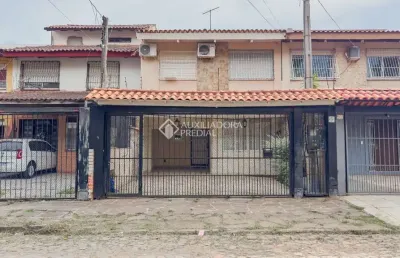 Casa com 3 quartos à venda na rua álvaro domingues, 104, parque santa fé, porto alegre, 91 m2 por r$ 450.000