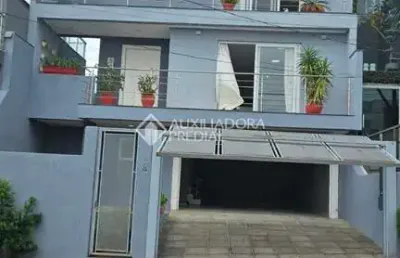 Casa em condomínio fechado com 4 quartos à venda na rua walter porto filho, 240, mário quintana, porto alegre, 284 m2 por r$ 895.000