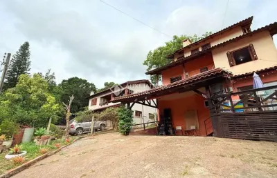 Casa em condomínio fechado com 4 quartos à venda na estrada dos alpes, 2345, cascata, porto alegre, 211 m2 por r$ 725.000