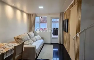 Casa em condomínio fechado com 2 quartos à venda na avenida joão ferreira jardim, 968, rubem berta, porto alegre, 59 m2 por r$ 212.000