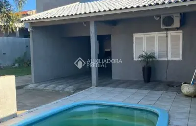 Casa com 3 quartos à venda na rua quarenta e sete, 53, jardim algarve, alvorada, 300 m2 por r$ 380.000