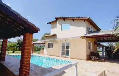 Descubra o refúgio dos seus sonhos: sua casa de luxo espera no ninho verde i eco residence, porangaba-sp