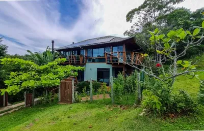 Casa em condomínio fechado com 4 quartos à venda na alto do morro, 2, praia da silveira, garopaba por r$ 2.300.000