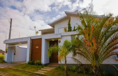 Casa em condomínio fechado com 3 quartos à venda na josé correia, 158, village, imbituba por r$ 1.620.000