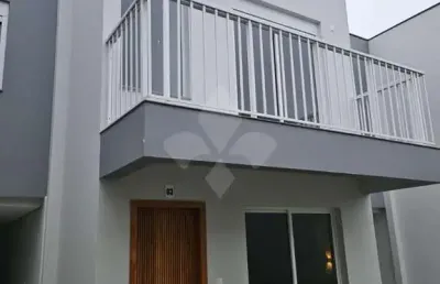 Casa em condomínio fechado com 2 quartos à venda na rodovia  jovino piucco, 142, centro, garopaba por r$ 1.100.000