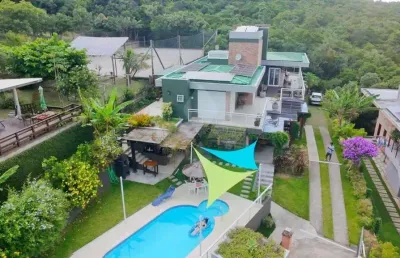 Casa em condomínio fechado com 5 quartos à venda na caminho do rei, 375, capão, garopaba por r$ 5.900.000