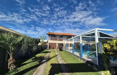 Casa em condomínio fechado com 3 quartos à venda na pinguirito, 1145, ambrósio, garopaba por r$ 2.130.000