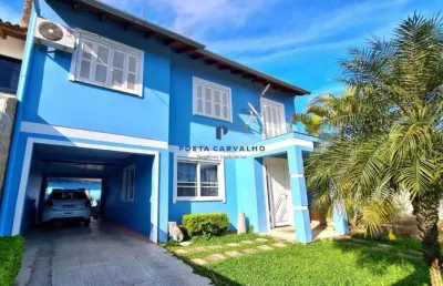 Casa com 3 quartos à venda na ivo lessa da silveira, 232, parque 35, guaíba por r$ 850.000
