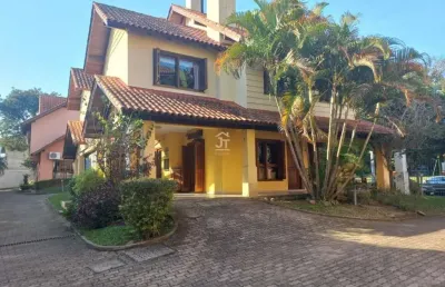 Casa em condomínio fechado com 3 quartos à venda na rua luís felipe monmany, 101, espírito santo, porto alegre por r$ 565.000