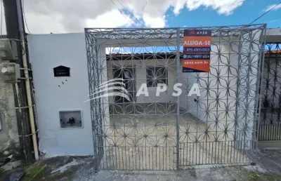Casa plana com garagem, 02 quartos, cozinha e area de serviço .