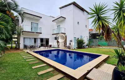 Casa em condomínio fechado com 4 quartos à venda na Rodovia Ba-099, 45, Itacimirim, Camaçari