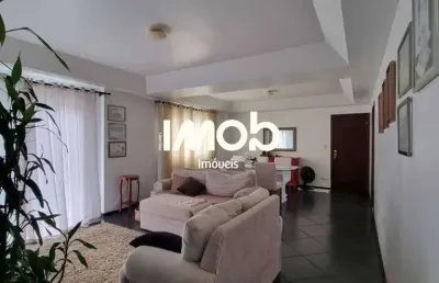 Apartamento semimobiliado com 1 suíte + 2 quartos, centro