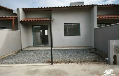 Casa com 2 quartos, suíte e varanda no bairro itajuba em barra velha