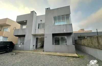 Apartamento térreo com 2 dormitórios e sacada com churrasqueira no bairro itajuba em barra velha