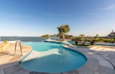 Casa com vista para o mar à venda, 10 suites um dos mais cobiçados bairros do guarujá o balneário pr