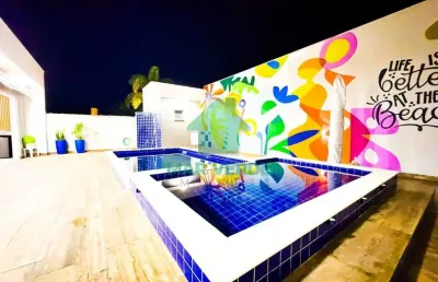 Casa 3 suítes com piscina em condomínio fechado mar verde caraguatatuba sp