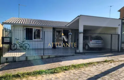 Encantadora casa com pátio localizada no bairro desvio rizzo