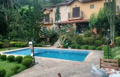 Espetacular casa em condomínio à venda aceita 70% em permuta!! a casa  tem 550 m² quadrados  1.450 metros de terreno com 4 suítes 8 vagas  na  serra da cantareira - mairiporã - sp.!!