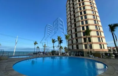 Apartamento no edifício beira mar, na belíssima praia martim de sá com vista para as montanhas.