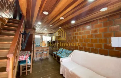 Apartamento - loft na martim de sá, a 500 metros da praia !