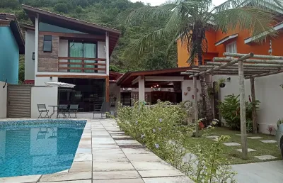 Casa à venda na Rua Gerônimo Lopes Agria, Jardim Guaiuba, Guarujá