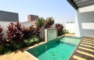 Casa em condomínio fechado com 4 quartos à venda no jardins gênova, uberlândia  por r$ 2.950.000