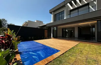 Casa em condomínio fechado com 4 quartos à venda no gávea, uberlândia  por r$ 3.600.000