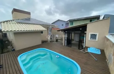 Casa com 3 quartos à venda na rua ipê rosa, 811, carianos, florianópolis, 141 m2 por r$ 1.500.000