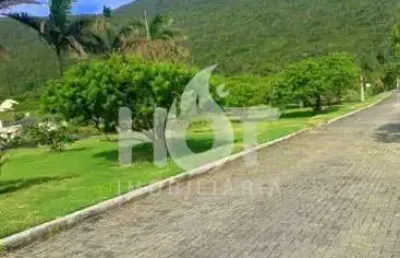 Terreno em condomínio fechado à venda na rodovia francisco thomaz dos santos, 12, pântano do sul, florianópolis, 390 m2 por r$ 440.000