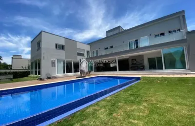 Casa em condomínio fechado com 6 quartos à venda na rodovia haroldo soares glavan, 1760, cacupé, florianópolis, 942 m2 por r$ 13.000.000