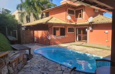 Casa em condomínio fechado com 4 quartos à venda na rodovia doutor antônio luiz moura gonzaga, 383, rio tavares, florianópolis, 200 m2 por r$ 2.950.000