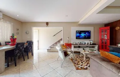 Vendo casa de três suítes e quatro vagas na pedro boticário em porto alegre