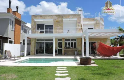 Vendo casa de quatro dormitórios no condomínio ilhas park em eldorado do sul