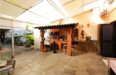Casa em condomínio fechado com 3 quartos à venda na Avenida Lavras, 530, Petrópolis, Porto Alegre