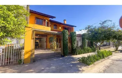 Casa em condomínio fechado com 4 quartos à venda na Rua Coronel Jaime da Costa Pereira, 340, Partenon, Porto Alegre