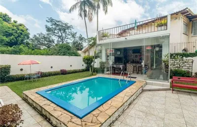 Casa em condomínio fechado com 7 quartos à venda na Rua Estácio de Sá, 332, Chácara das Pedras, Porto Alegre