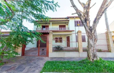 Casa em condomínio fechado com 4 quartos à venda na Rua das Guabirobas, 112, Igara, Canoas