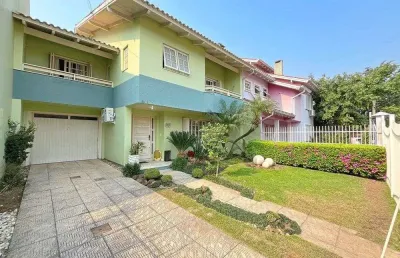 Casa em condomínio fechado com 4 quartos à venda na Rua Adão Pinheiro da Silva, 85, Ipanema, Porto Alegre