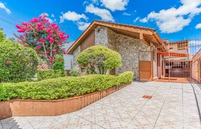 Casa em condomínio fechado com 5 quartos à venda na Rua Doutor Mário Totta, 2901, Cavalhada, Porto Alegre