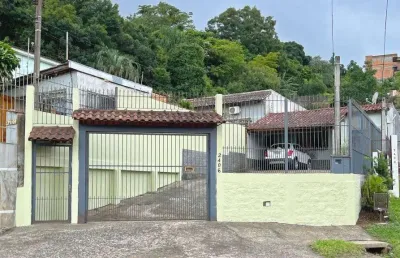 Casa em condomínio fechado com 3 quartos à venda na Avenida Vicente Monteggia, 2406, Vila Nova, Porto Alegre