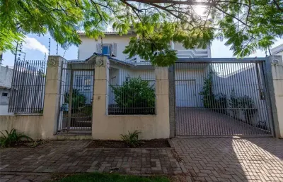 Casa em condomínio fechado com 4 quartos à venda na Rua das Bromélias, 184, Moinhos De Vento, Canoas