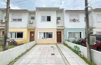 Casa em condomínio fechado com 3 quartos à venda na Avenida Edgar Pires de Castro, 2520, Hípica, Porto Alegre