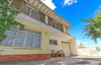 Casa em condomínio fechado com 5 quartos à venda na Rua João Bastian, 24, Três Figueiras, Porto Alegre