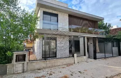 Casa em condomínio fechado com 4 quartos à venda no campeche, florianópolis  por r$ 4.300.000