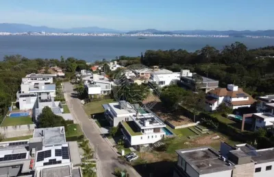 Terreno em condomínio fechado à venda no cacupé, florianópolis  por r$ 3.700.000